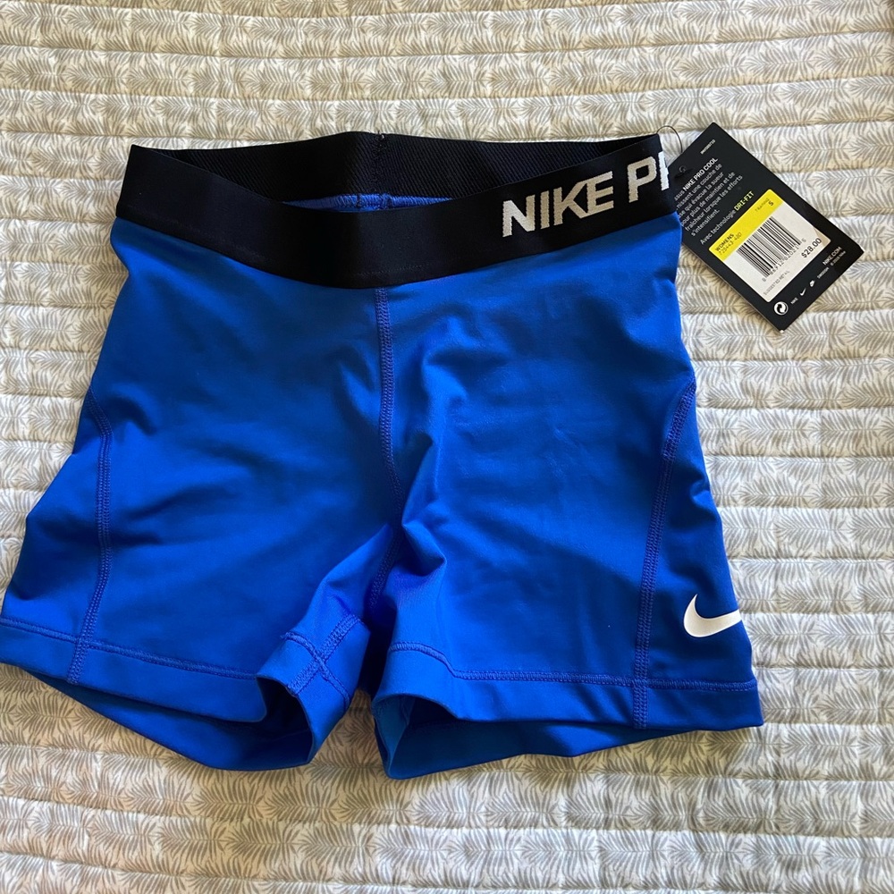 Nike Dri-Fit athletic shorts. Size S, tags still on.